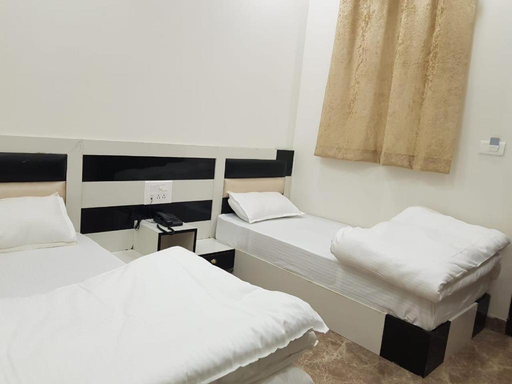 New Gokul Grand Hotel Dehradun Værelse billede